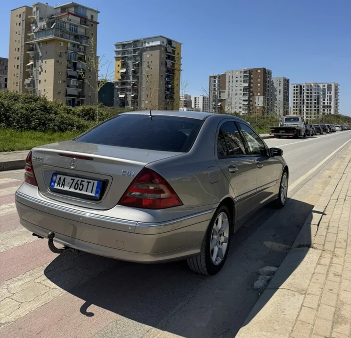 Grey Mercedes C-Class 2007 2.2 diesel automatic sedan rear three-quarter view parked on a street in Tirana