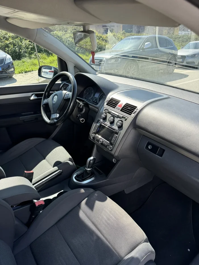 Interior of VW Touran automatic 7 seater rental in Tirana (3)