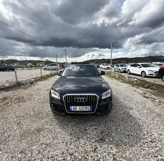 Black Audi Q5 2015 3.0 TDI diesel automatic premium SUV with panoramic sunroof and leather interior available for family car rental at Tirana Airport Albania